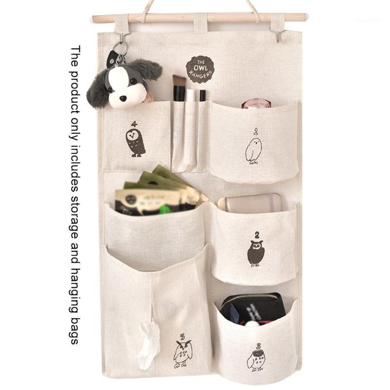 New cotton and linen multi-pocket storage bag hanging bag tissue storage fabric wall hanging door debris1
New cotton and linen multi-pocket storage bag hanging bag tissue storage fabric wall hanging door debris1