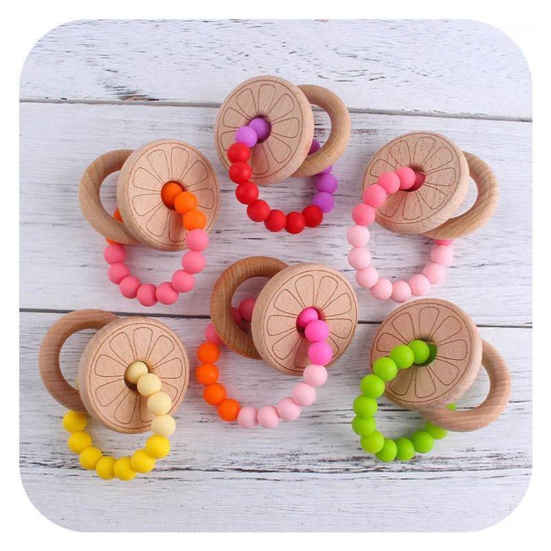 2020 new DIY Flower Silicone Baby Teethers Handmade Natural Wooden baby teething Kids Teether Teething Ring Toys Infant Tee1
2020 new DIY Flower Silicone Baby Teethers Handmade Natural Wooden baby teething Kids Teether Teething Ring Toys Infant Tee1