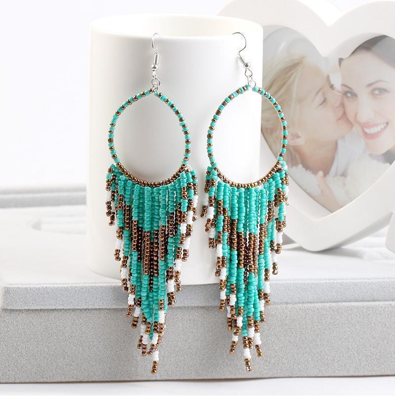European and American Popular Jewelry Retro Bohemian Ethnic Style Earrings Long Rice Beaded Tassel Earrings Female1
European and American Popular Jewelry Retro Bohemian Ethnic Style Earrings Long Rice Beaded Tassel Earrings Female1