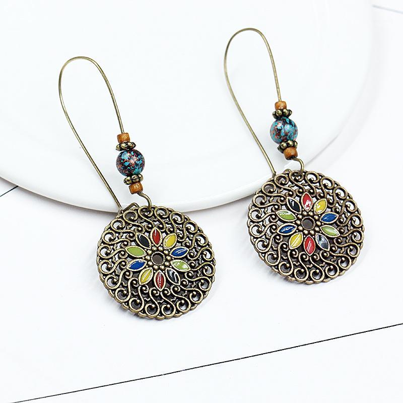 Hoop & Huggie Vintage Bronze Hollow Round Pendant Earrings For Women Ethnic Bohemia Beads Flower Drop Ear Cuff Hoop1
Hoop & Huggie Vintage Bronze Hollow Round Pendant Earrings For Women Ethnic Bohemia Beads Flower Drop Ear Cuff Hoop1