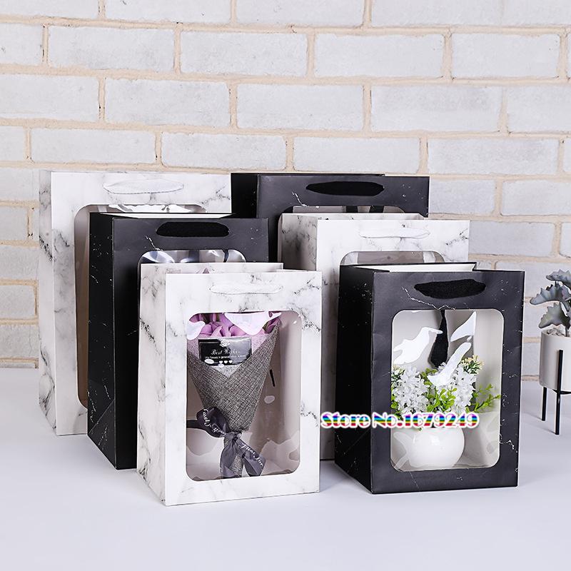 100pcs/lot Black Marble paper bag with Clear window. Clothing scarf toy shipping bag. luxury gift bags with handles party favor
100pcs/lot Black Marble paper bag with Clear window. Clothing scarf toy shipping bag. luxury gift bags with handles party favor
