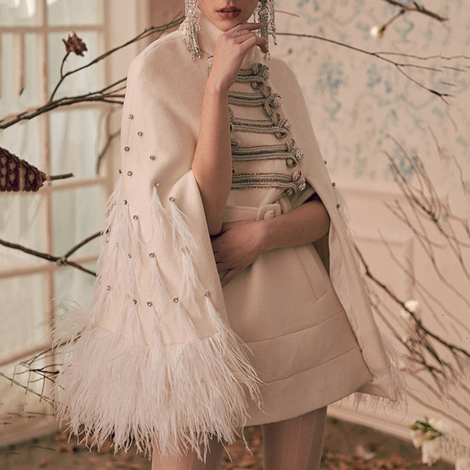 EWQ Feather Diamond Belt White Jacket Winter Stitching Coats Female High Collar Sexy Bodycon Cloak Style Overcoat 201029