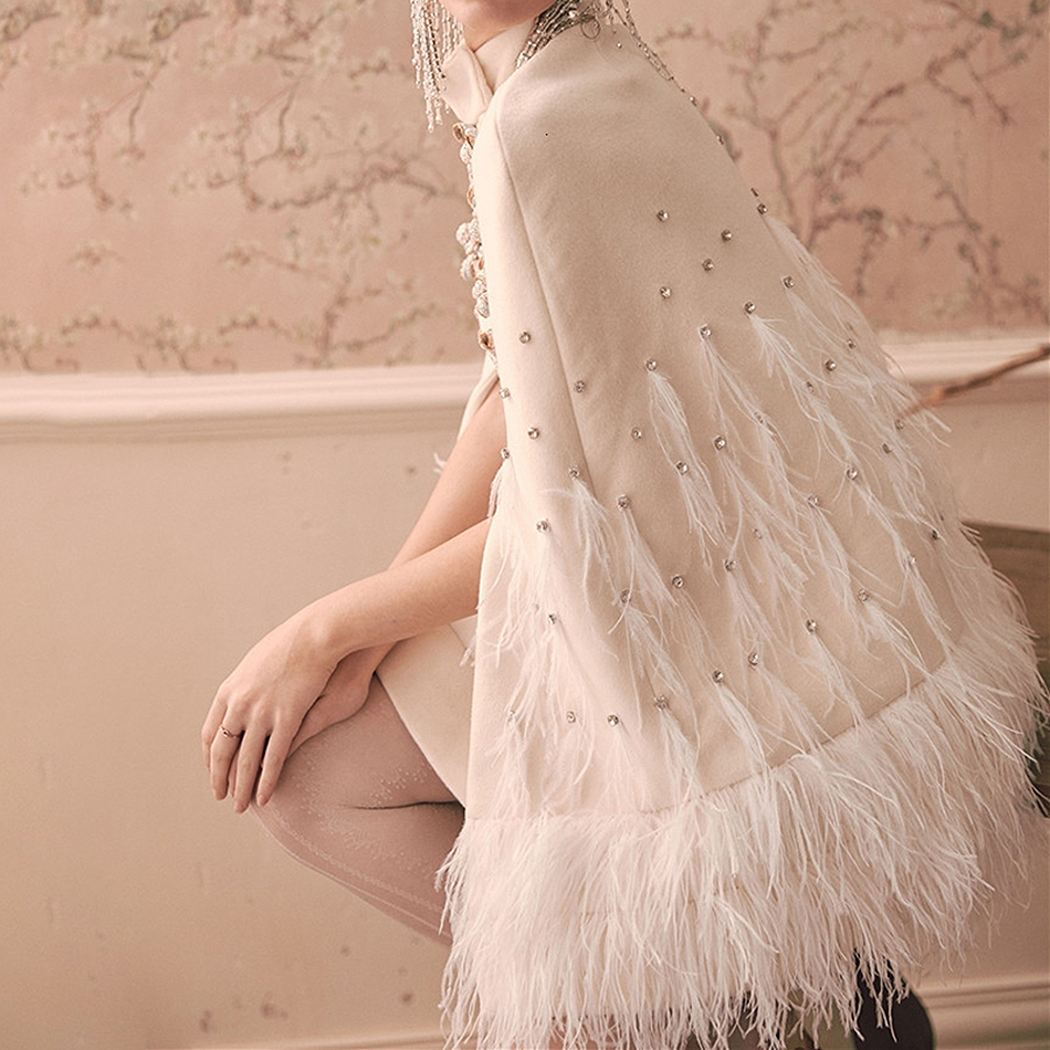 EWQ Feather Diamond Belt White Jacket Winter Stitching Coats Female High Collar Sexy Bodycon Cloak Style Overcoat 201029