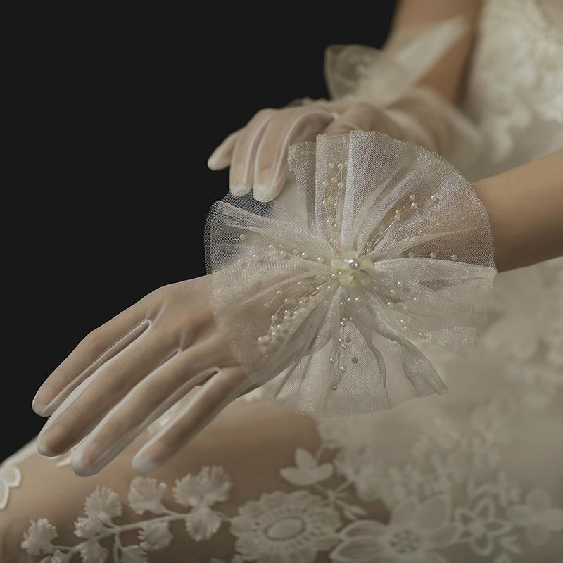 Women's elegant pearl beaded big bow white mesh glove female spring summer vintage dot sunscreen lace driving glove R3378
Women's elegant pearl beaded big bow white mesh glove female spring summer vintage dot sunscreen lace driving glove R3378