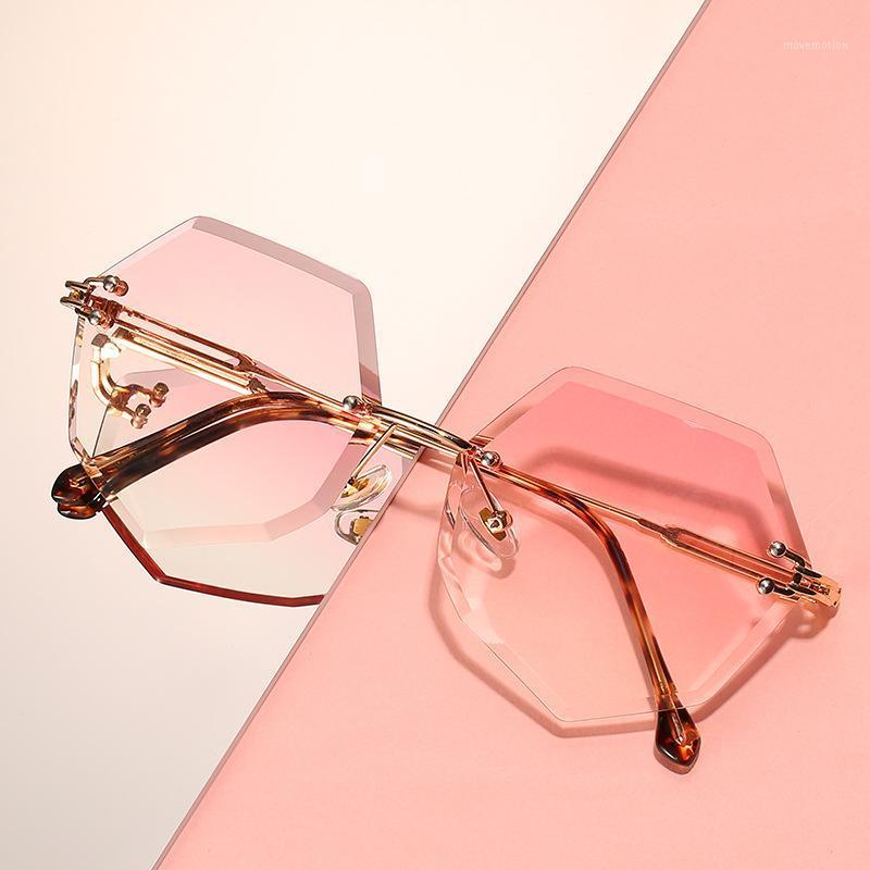 2020 Fashion Brand Design Rimless Sunglasses Women Vintage Sexy Cutting Lens Gradient Round Metal Sun Glasses For Female UV4001
2020 Fashion Brand Design Rimless Sunglasses Women Vintage Sexy Cutting Lens Gradient Round Metal Sun Glasses For Female UV4001