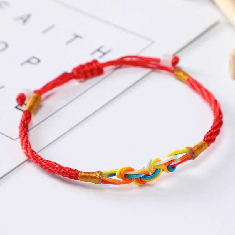 

Handmade Tibetan Dorje Knot Woven Creative Style Bracelet of Red String Korean Style Plum Buckle Colorful Wire Ball Red Rope1
