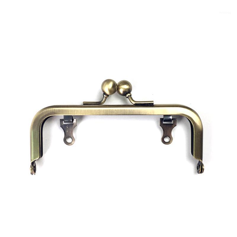 Square Bronze Tone Metal Purse Bag Frames Clutch Smooth Kiss Clasps 10cm No Holes Handbag Handles Buckle DIY Luggage Hardware1
Square Bronze Tone Metal Purse Bag Frames Clutch Smooth Kiss Clasps 10cm No Holes Handbag Handles Buckle DIY Luggage Hardware1
