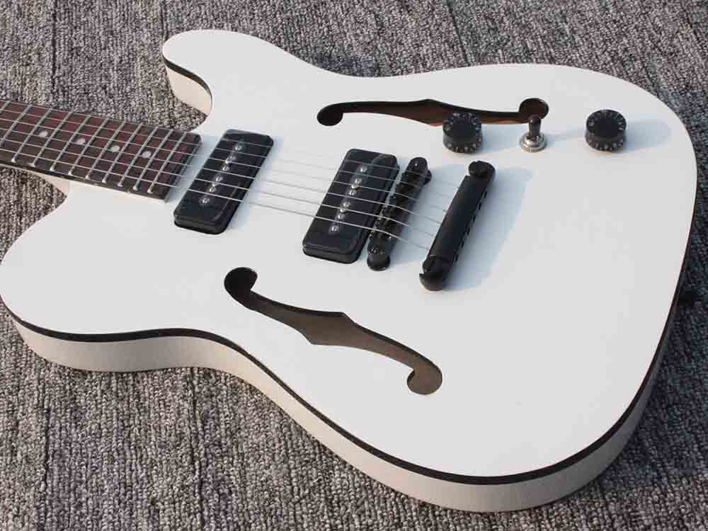 High quality F hole semi-hollow TELE electric guitar, metal guitar accessories, accept custom guitar
High quality F hole semi-hollow TELE electric guitar, metal guitar accessories, accept custom guitar
