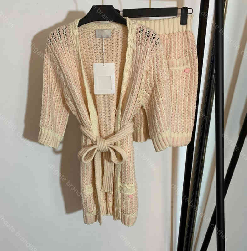 Newest design women skirt sweater crochet mujer wool knit coat dress two piece suit belt corset logo button 5A quality female Apparel wholesale
Newest design women skirt sweater crochet mujer wool knit coat dress two piece suit belt corset logo button 5A quality female Apparel wholesale