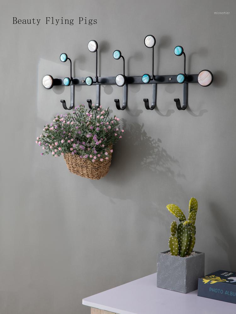 Creative home hangers into the door behind the wall hanging wall porch coat bag key racks wrought iron clothes hook1
Creative home hangers into the door behind the wall hanging wall porch coat bag key racks wrought iron clothes hook1