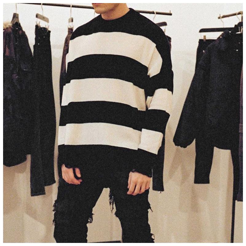 British style trendy Represent knitted sweater men' tassel hole black and white striped street loose knitted sweater couple
British style trendy Represent knitted sweater men' tassel hole black and white striped street loose knitted sweater couple