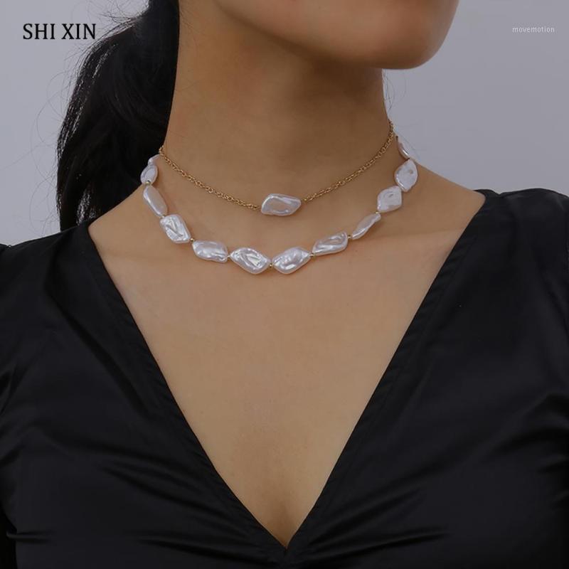 SHIXIN 2 Pcs/Set Imitation Baroque Pearl Choker Necklace for Women Short Choker Colar on the Neck Wedding Necklaces 2020 Fashion1
SHIXIN 2 Pcs/Set Imitation Baroque Pearl Choker Necklace for Women Short Choker Colar on the Neck Wedding Necklaces 2020 Fashion1