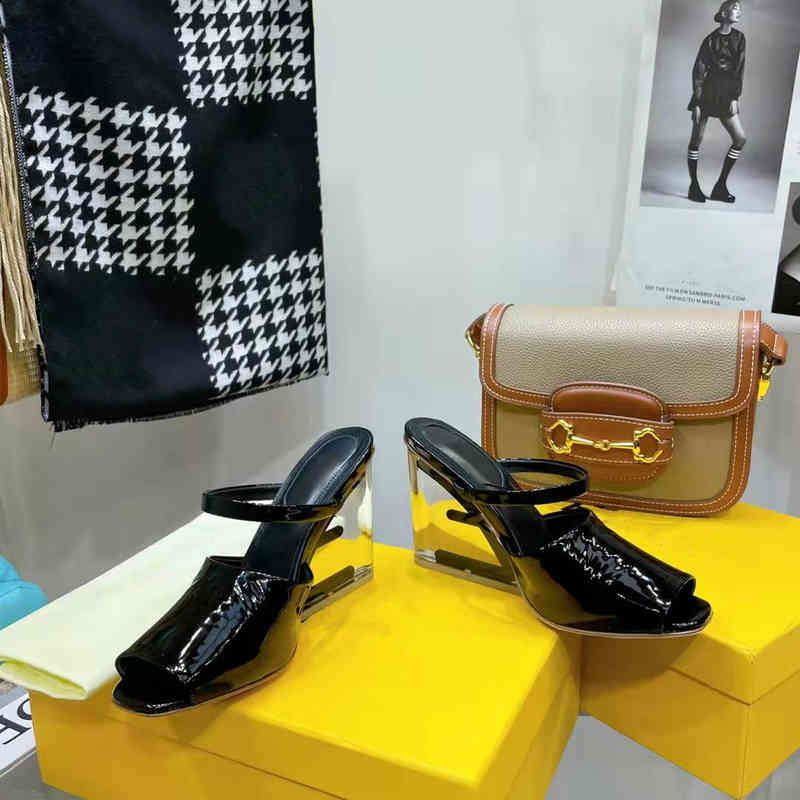 Sandals leather First Black high-heeled sandals with wide band and strap. Made of leather. Diagonal F-shaped sculpted heel in gold-coloured metal GK34, 1# shoe box
Sandals leather First Black high-heeled sandals with wide band and strap. Made of leather. Diagonal F-shaped sculpted heel in gold-coloured metal GK34, 1# shoe box