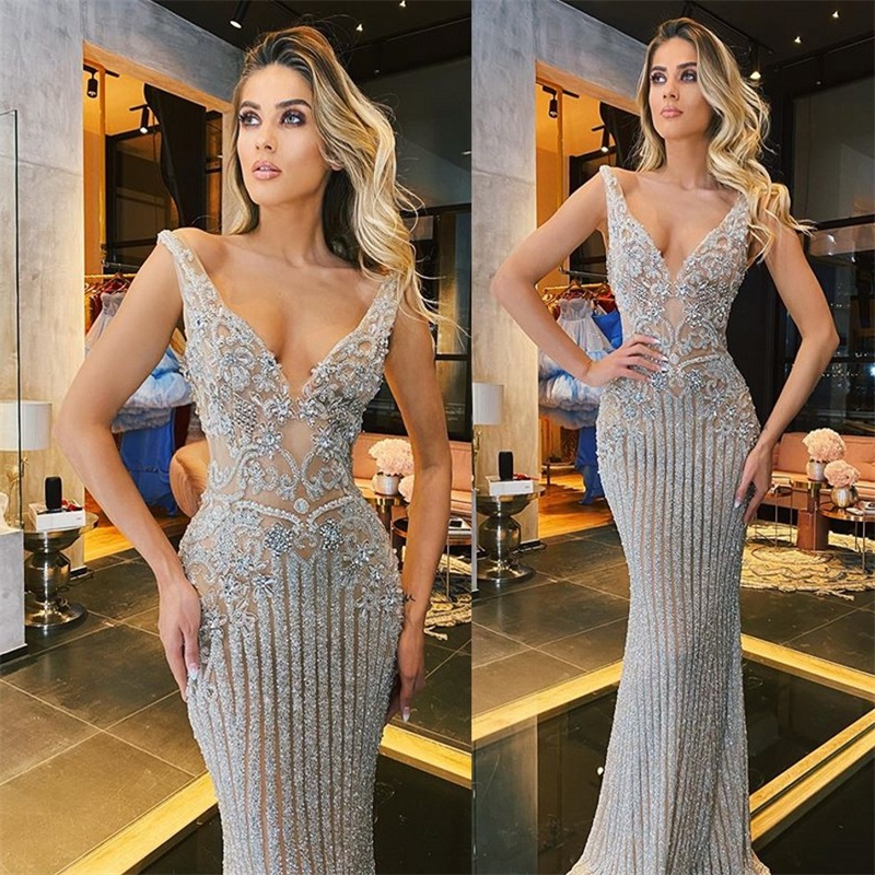 Luxury Prom Dresses Sexy V Neck Glitter Sequins Crystal Beads Ruffles Sheath Evening Dresses Sleeveless Illusion Sheer Party Dress