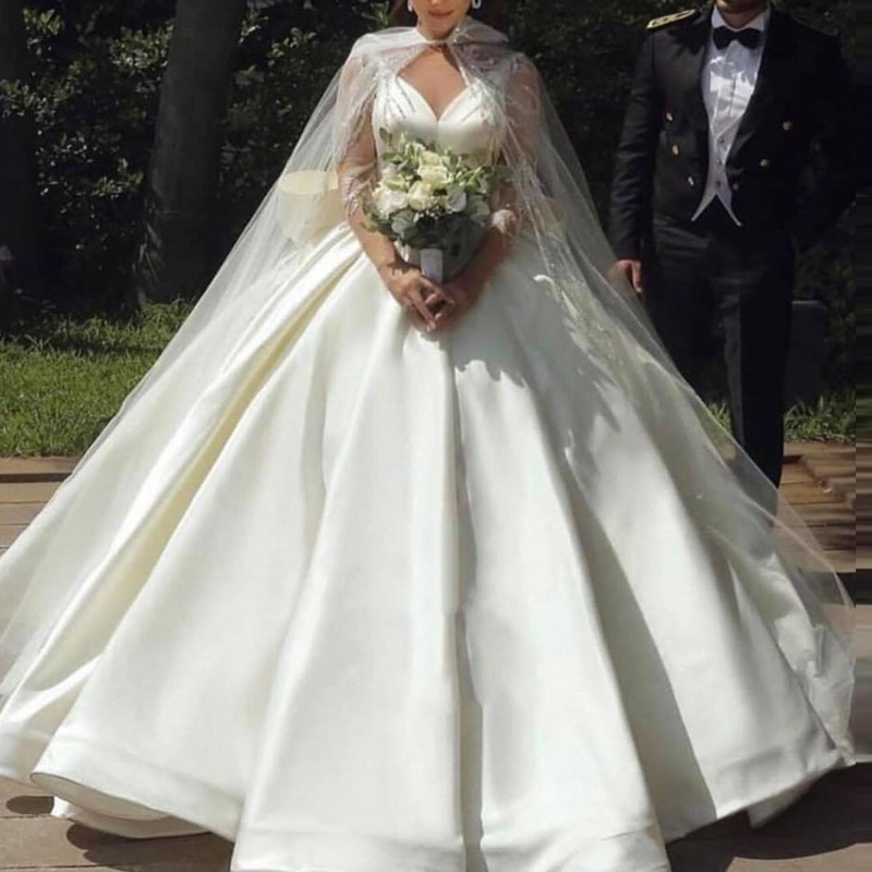 Princess Ball Gown Wedding Dresses With Tulle Cape Sheer Neck Illusion Long Sleeves Sequins Applqiues Bridal Gowns Vestidos