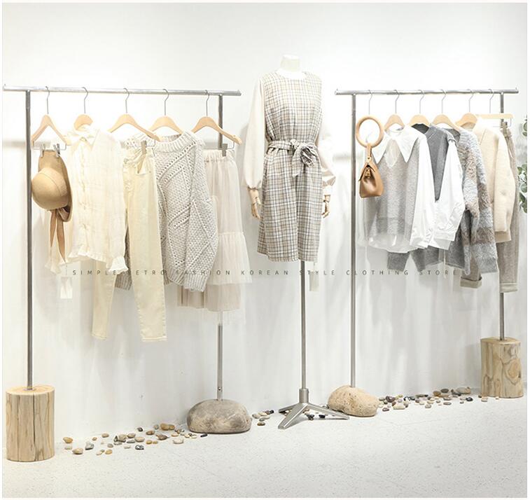 Customized stainless steel silver rack Commercial Furniture drawing stone floor hanging racks women's cloth shop display shelf