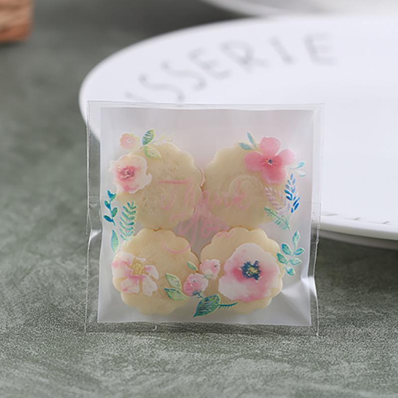 

100pcs/pack Gift Packing Bag Translucent Grade Plastic Peach Blossom Pattern Thank You Party Wedding Decor1