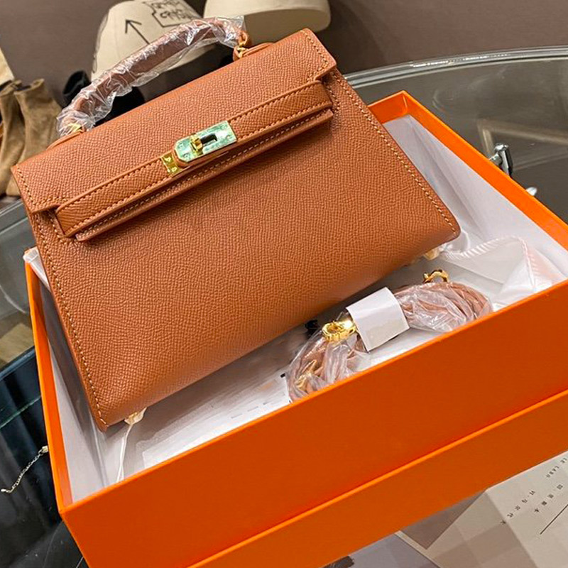 Women Luxurys Handbag Purse Epsom Designers Leather Shoulder Bags Ladies Tote Bag wallet Steel hardware Hand bags Package Box 12 Color
Women Luxurys Handbag Purse Epsom Designers Leather Shoulder Bags Ladies Tote Bag wallet Steel hardware Hand bags Package Box 12 Color