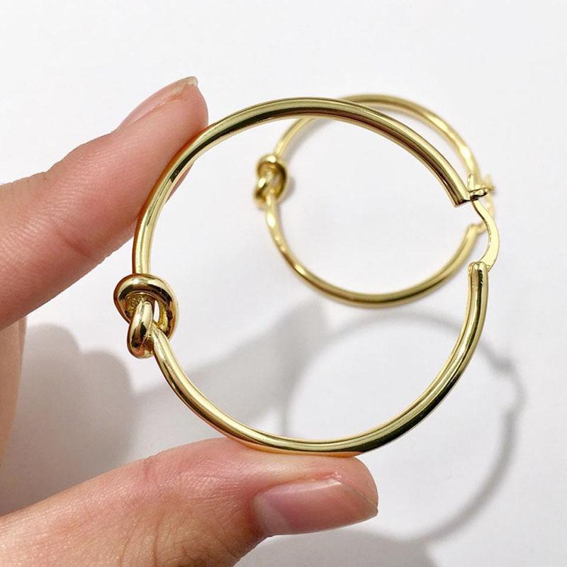 Japanese Korean fashion designer gold stainless steel ladies earrings exaggerated knot large circle earrings luxury jewelry 20201
Japanese Korean fashion designer gold stainless steel ladies earrings exaggerated knot large circle earrings luxury jewelry 20201