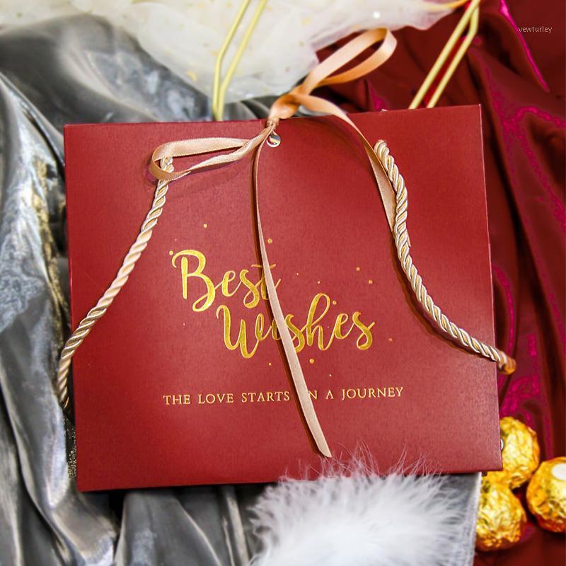 10pcs Handbag Shopping Bag paper Candy box Gift Bags With Handles Luxury Handbag Wedding party Birthday gift bag1 
10pcs Handbag Shopping Bag paper Candy box Gift Bags With Handles Luxury Handbag Wedding party Birthday gift bag1