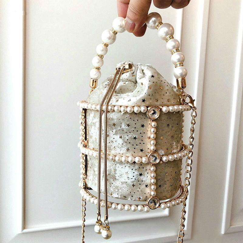 2020 Luxury Designer Korean Handmade Alloy Metallic Clutch Bag Hollow Out Pearl Bucket Evening Bag Women Ladies Shoulder Bags1
2020 Luxury Designer Korean Handmade Alloy Metallic Clutch Bag Hollow Out Pearl Bucket Evening Bag Women Ladies Shoulder Bags1