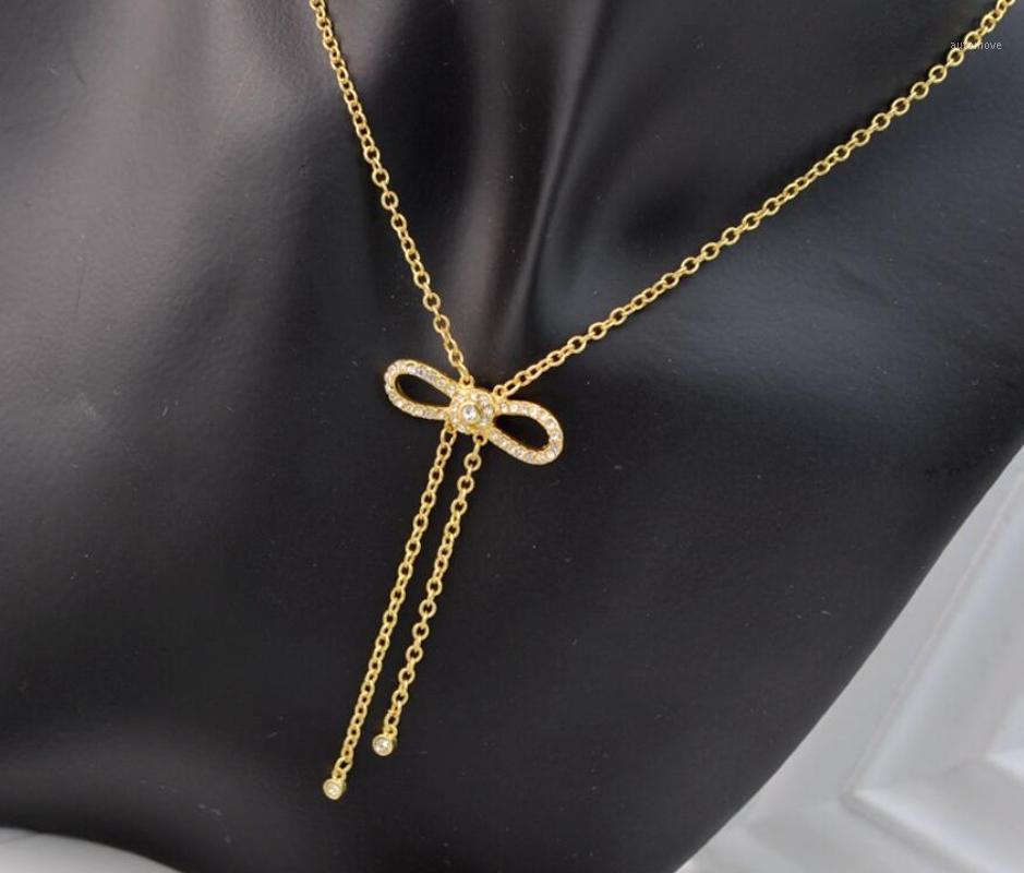 CSXjd High Quality copper Bowknot full crystal inlaid double pendant tassel simple short necklace1
CSXjd High Quality copper Bowknot full crystal inlaid double pendant tassel simple short necklace1