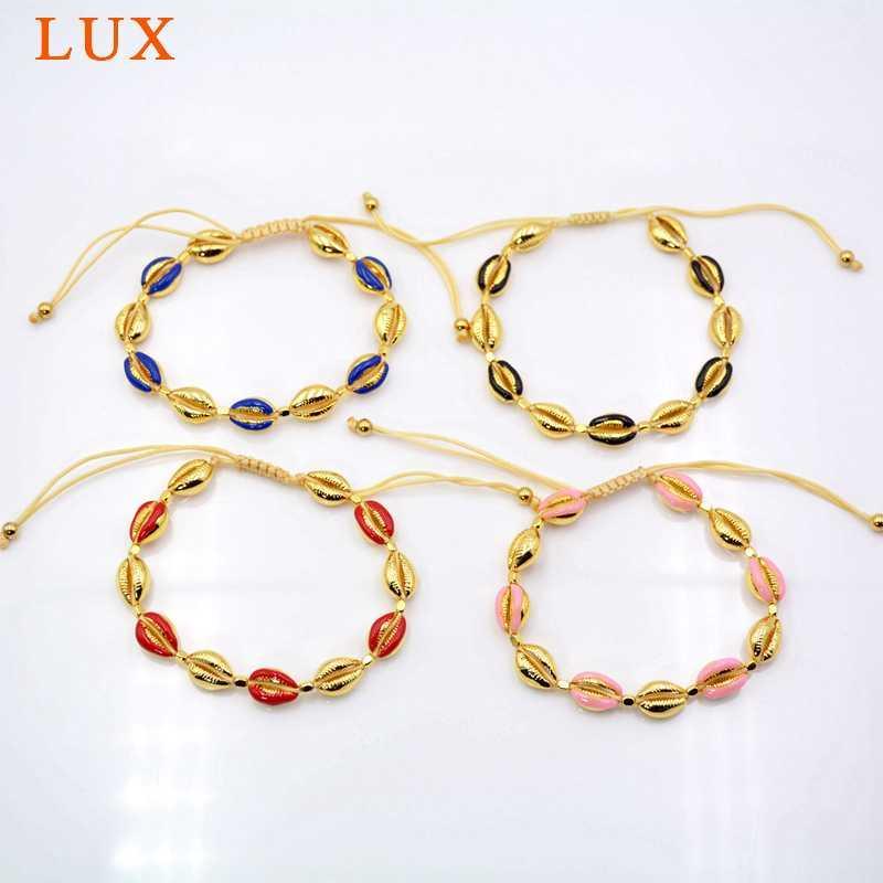 gold plating copper metal bracelets handmade cowrie shell shape bangle fashion jewelry for girls1
gold plating copper metal bracelets handmade cowrie shell shape bangle fashion jewelry for girls1