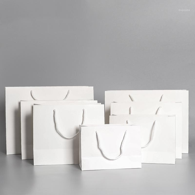 10pcs/lot White High Quality Simple Paper Gift Bag Wedding Birthday Party Gift Package Bags Kraft Paper Candy Box With Handle1
10pcs/lot White High Quality Simple Paper Gift Bag Wedding Birthday Party Gift Package Bags Kraft Paper Candy Box With Handle1