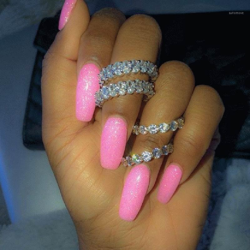 2020 New Iced Out Rose Gold Pink cz Eternity Band Ring Luxury Jewelry 5A Stone Promise Party HipHop Bling Women Ring1
2020 New Iced Out Rose Gold Pink cz Eternity Band Ring Luxury Jewelry 5A Stone Promise Party HipHop Bling Women Ring1