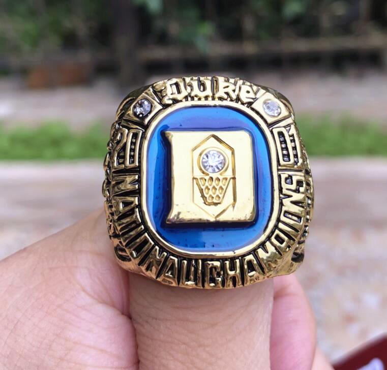 DUKE BLUE 2001 DEVILS NATIONAL Team Championship Ring With Wooden BOX Men Fan Souvenir Gift Wholesale 2019 Drop Shipping
DUKE BLUE 2001 DEVILS NATIONAL Team Championship Ring With Wooden BOX Men Fan Souvenir Gift Wholesale 2019 Drop Shipping