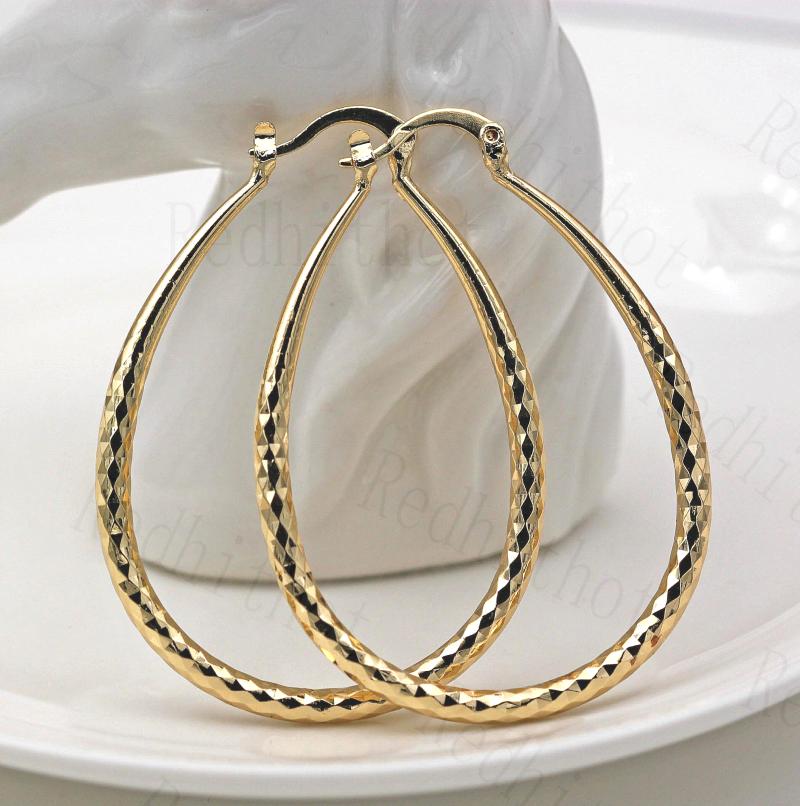 Luxury Hoop Earrings for Women Gold Color Geometric shape Earring Trendy Jewelry for Wedding Anniversary Gift
Luxury Hoop Earrings for Women Gold Color Geometric shape Earring Trendy Jewelry for Wedding Anniversary Gift