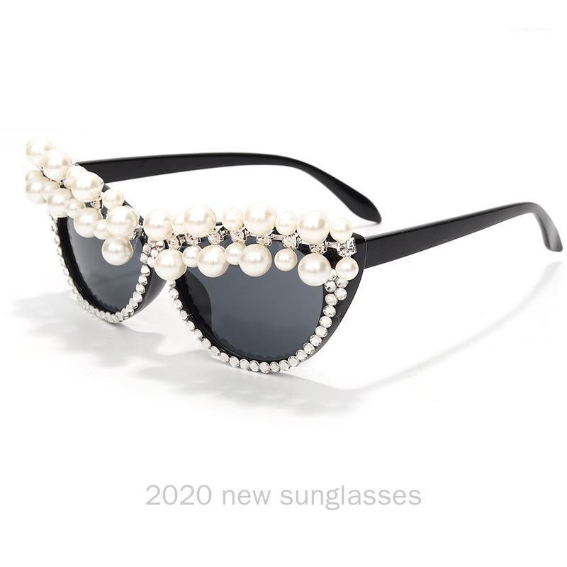 2020 Newest Sexy Cat Sunglasses Women Brand Designer Lady Pearl Sun Glasses For Female Vintage Shades Eyewear UV400 with box NX1 
2020 Newest Sexy Cat Sunglasses Women Brand Designer Lady Pearl Sun Glasses For Female Vintage Shades Eyewear UV400 with box NX1