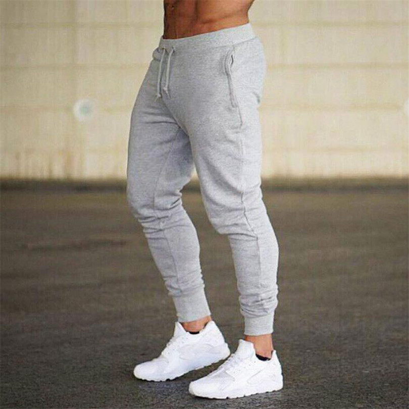 New Sportswear Fitness Pants Casual Polyester Mens Fitness Workout Pants Skinny Sweatpants Trousers Jogger Pants T200319