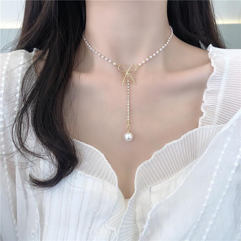 2021 latest fashion niche design sense bow knot pearl necklace female ins cold temperament simple clavicle chain necklace female
2021 latest fashion niche design sense bow knot pearl necklace female ins cold temperament simple clavicle chain necklace female