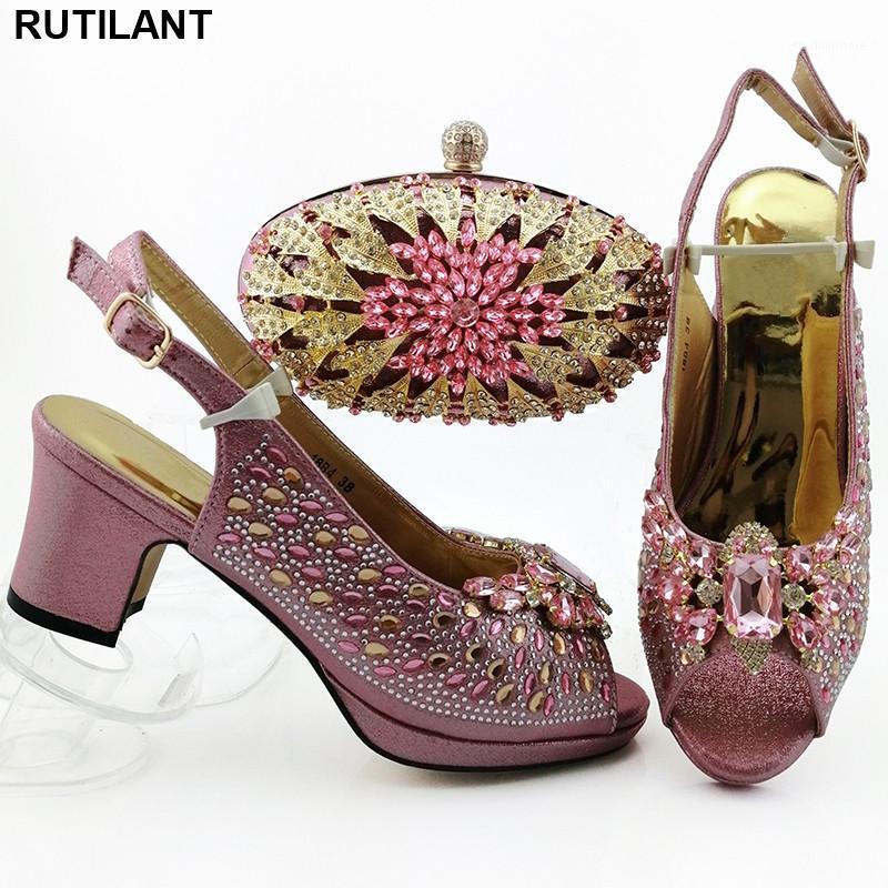 New Fashion African Party Shoe and Bag Set High Quality African Wedding Shoes Shoe and Bag Set Decorated with Rhinestone1, Gold
New Fashion African Party Shoe and Bag Set High Quality African Wedding Shoes Shoe and Bag Set Decorated with Rhinestone1, Gold