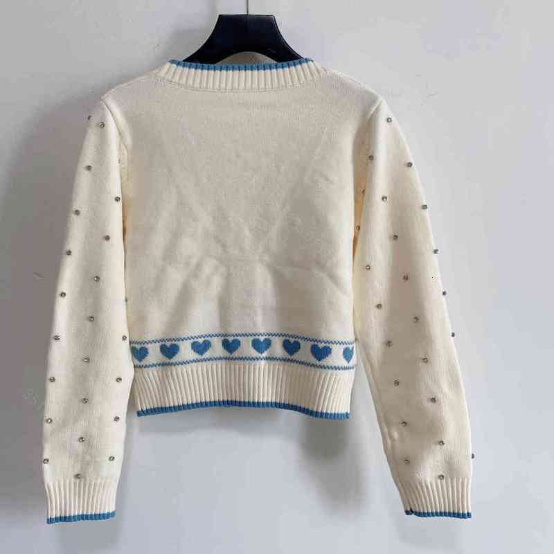 Women' Sweaters women knitted Autumn sweater brand wool knitting hooded sweatshirt long-sleeved womens tops coats jackets V-neck pearl seatsers designer 58QS
Women' Sweaters women knitted Autumn sweater brand wool knitting hooded sweatshirt long-sleeved womens tops coats jackets V-neck pearl seatsers designer 58QS