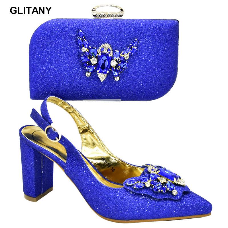Latest Matching Women Shoe and Bag Set Decorated with Rhinestone Italian Shoe and Bag Set Buckle Strap Decorated with Appliques, Blue only shoes
Latest Matching Women Shoe and Bag Set Decorated with Rhinestone Italian Shoe and Bag Set Buckle Strap Decorated with Appliques, Blue only shoes
