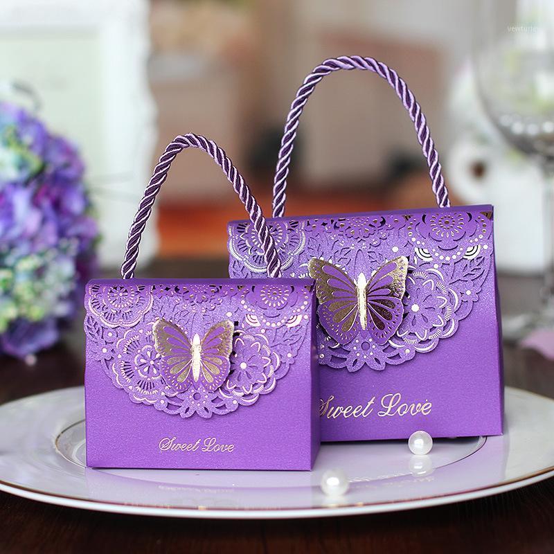 2pcs/lot Butterfly Hand Bag Sweet Love Blue Butterfly Wedding Handing Candy Box Beautiful Party Printed Flower Candy Gift Box1
2pcs/lot Butterfly Hand Bag Sweet Love Blue Butterfly Wedding Handing Candy Box Beautiful Party Printed Flower Candy Gift Box1