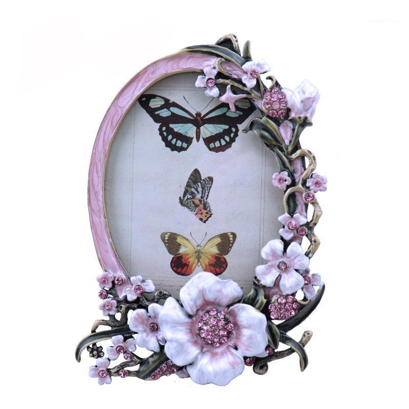 European-style small photo frame home creative metal combination photo frame lovely enamel color metal decoration1
European-style small photo frame home creative metal combination photo frame lovely enamel color metal decoration1