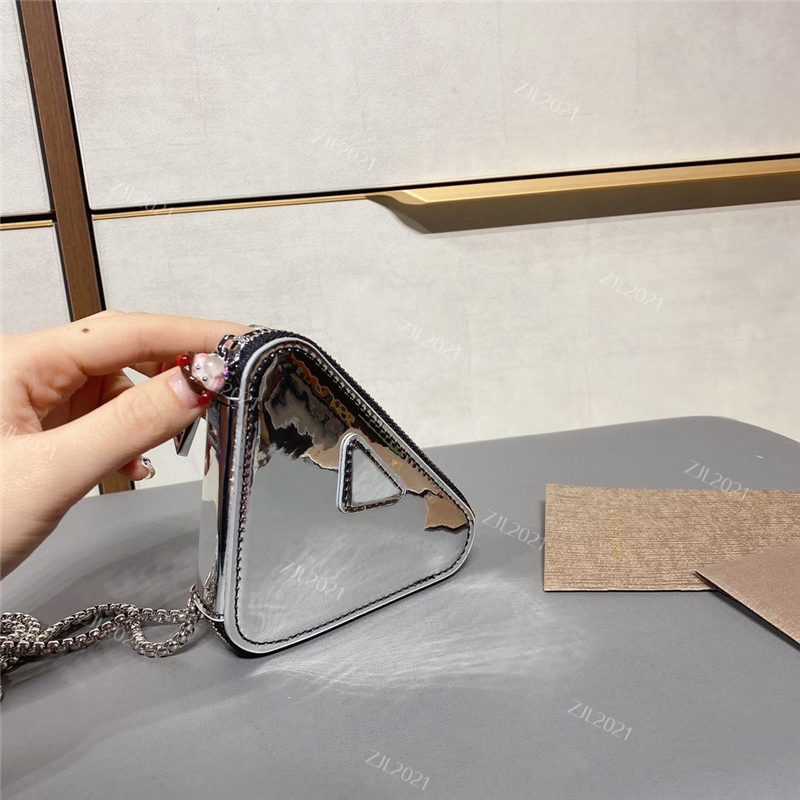 Triangle bag iridescent Cross Body Women Luxurys Designers Bags 2020 Trendy Gadgets Fashion Mini triangle bag Zero wallet, Box
Triangle bag iridescent Cross Body Women Luxurys Designers Bags 2020 Trendy Gadgets Fashion Mini triangle bag Zero wallet, Box