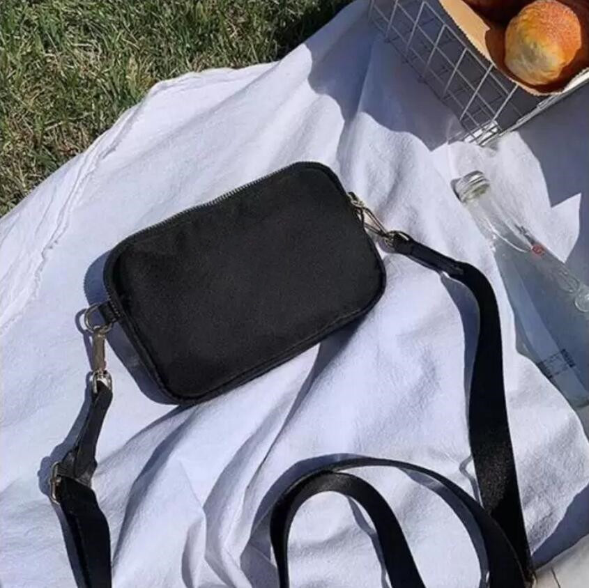 Very Elegant Black nylon canvas bag Brand Messenger Bags Men women outdoor sports backpack fashion Zipper Pocket
Very Elegant Black nylon canvas bag Brand Messenger Bags Men women outdoor sports backpack fashion Zipper Pocket