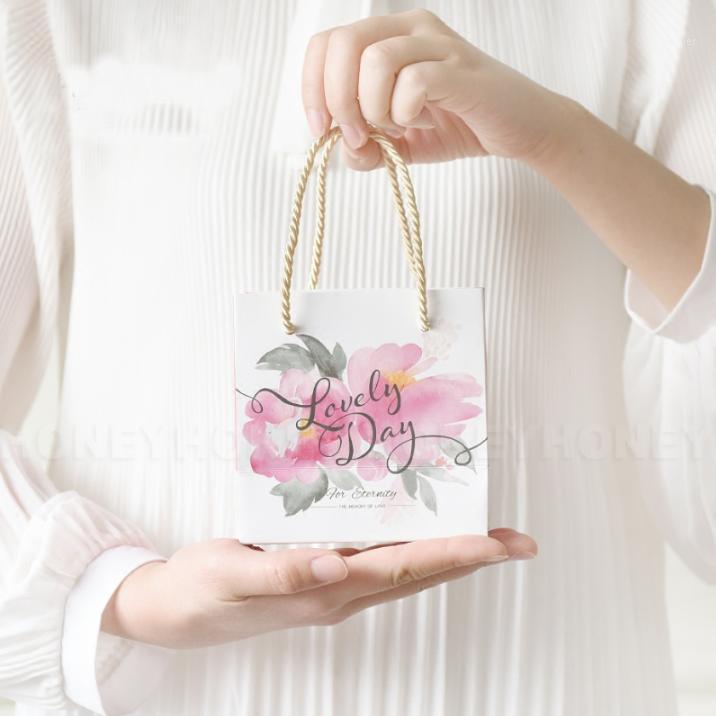 50 Pcs Mini Flower Blossom Wedding Favors Gift Bags Return Present Handbag Paper Bag For Holding Gift Box / Candy Box, 12x7x12cm1
50 Pcs Mini Flower Blossom Wedding Favors Gift Bags Return Present Handbag Paper Bag For Holding Gift Box / Candy Box, 12x7x12cm1