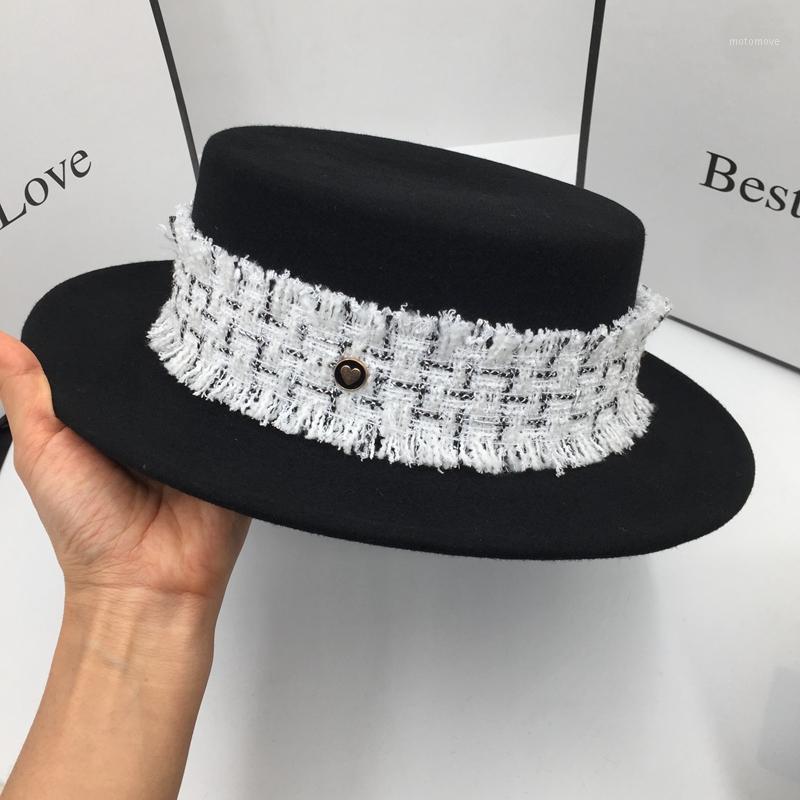 During the spring and autumn winter new black and white wool hat for women fashion tide fedoras1
During the spring and autumn winter new black and white wool hat for women fashion tide fedoras1