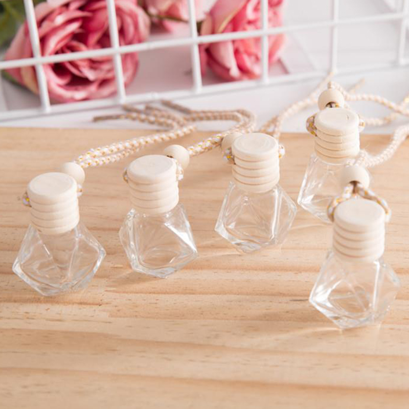 Rhombic Car Pendant Perfume Bottle Glass Ornaments Empty Bottles Round Wooden Lid Essential Oils Diffusers Air Freshener F3
Rhombic Car Pendant Perfume Bottle Glass Ornaments Empty Bottles Round Wooden Lid Essential Oils Diffusers Air Freshener F3