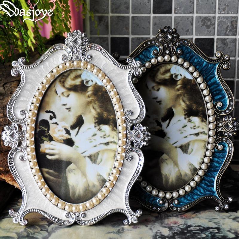 European Vintage luxury Pearl Metal Photo Frame Picture oval classical creative set table Home desktop Wedding Decoration1
European Vintage luxury Pearl Metal Photo Frame Picture oval classical creative set table Home desktop Wedding Decoration1