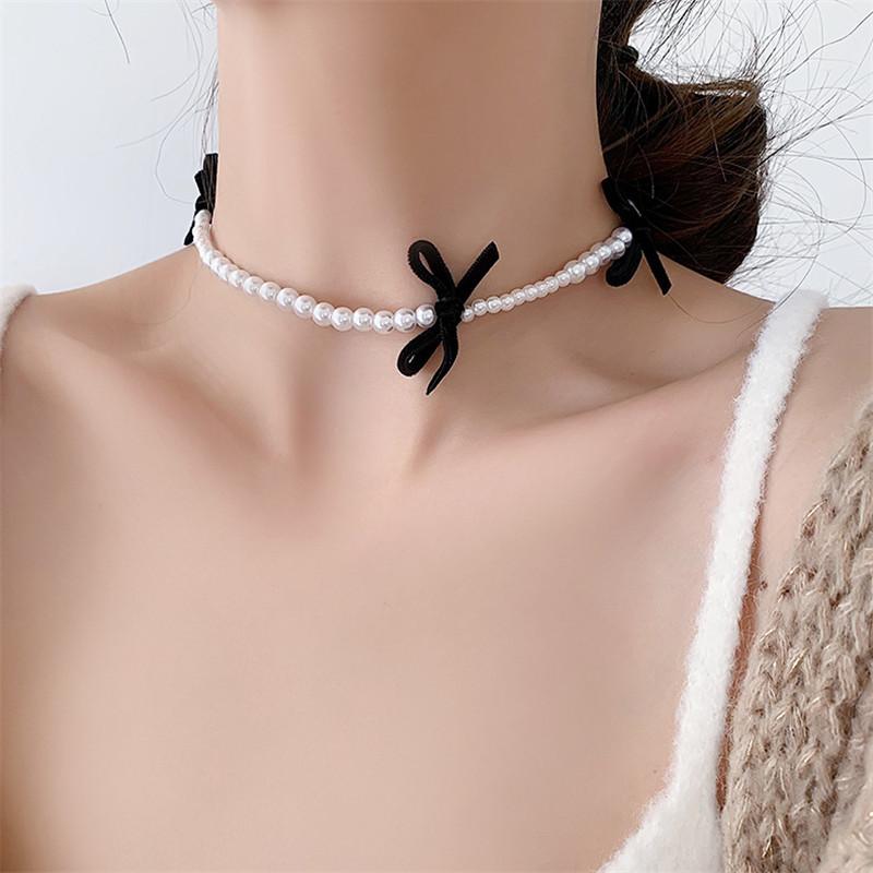 Chokers 2021 Korean Black Bowknot Simulated Pearl Strand Necklaces Trendy Temperament Fashion Jewelry Party Collares
Chokers 2021 Korean Black Bowknot Simulated Pearl Strand Necklaces Trendy Temperament Fashion Jewelry Party Collares