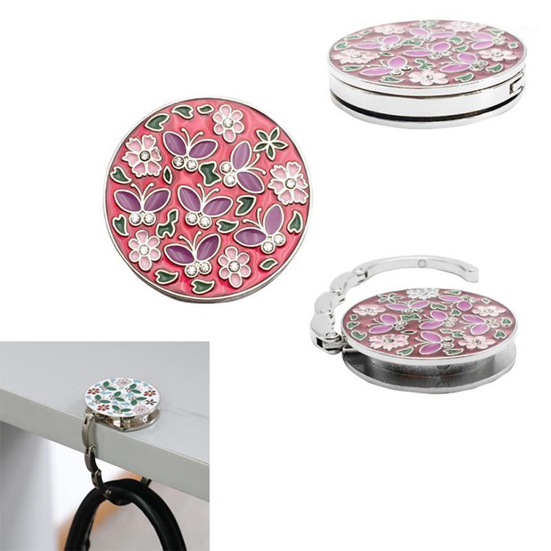 Hooks & Rails Mini Foldable Folding Table Handbag Hook Purse Tote Flower Shape Metal Bag Hanger Holder Decoration For Home
Hooks & Rails Mini Foldable Folding Table Handbag Hook Purse Tote Flower Shape Metal Bag Hanger Holder Decoration For Home