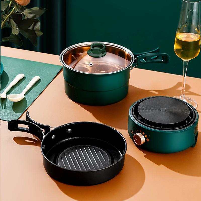 Portable electric cooker for one person, small travel single non-stick pan, folding multi-function separate special hot pot1
Portable electric cooker for one person, small travel single non-stick pan, folding multi-function separate special hot pot1