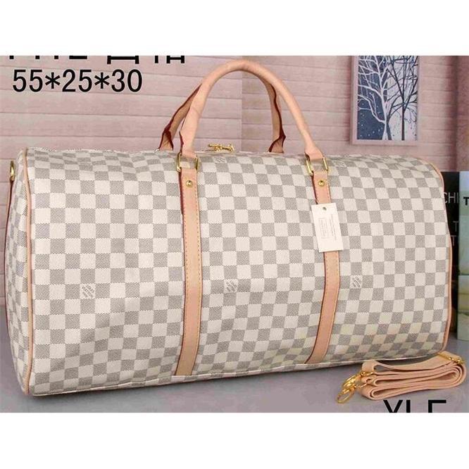 2020 NEW men Luxury designer duffle bag women travel bags hand luggage men pu leather handbags large cross body bag totes 55cm
2020 NEW men Luxury designer duffle bag women travel bags hand luggage men pu leather handbags large cross body bag totes 55cm