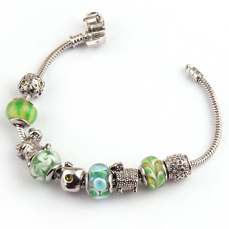 Free shipping European Green Murano Glass Bead tone and dog,sheep, with cz stone Metal charm bracelet
Free shipping European Green Murano Glass Bead tone and dog,sheep, with cz stone Metal charm bracelet